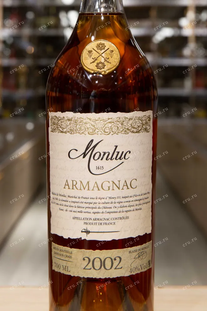 Этикетка Monluc 2002 0.7 л