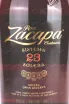 Контрэтикетка Zacapa Centenario Solera Gran Reserva 23 years gift box 1 л
