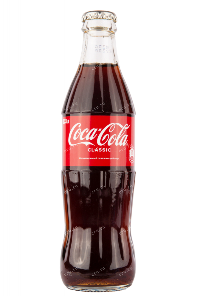 Газированный напиток Coca-Cola в стекляной бутылке 0.33 л